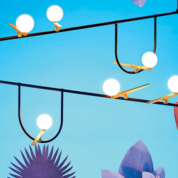 Artemide Yanzi - Ikonische Schwalben aus Messing